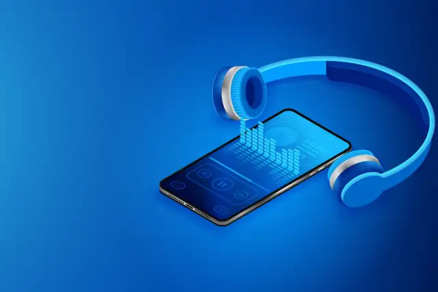 Słuchawki i smartfon z equalizerem. Idealne miejsce na muzyka do pobrania za darmo na telefon android.