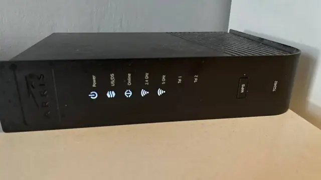 Router Arris TG2492 z przyciskiem WPS. Dowiedz się, wps co to jest i jak działa.