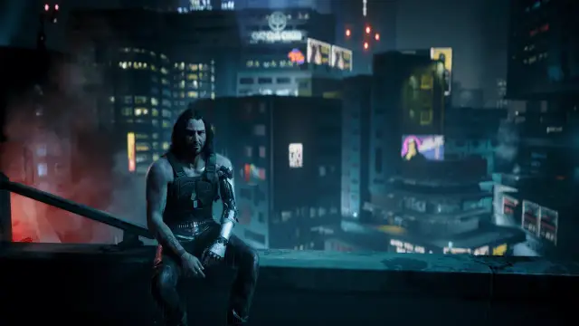Mężczyzna z cybernetycznym ramieniem siedzi na dachu, patrząc na nocne miasto. Nawet w świecie cyberpunk dobre uczynki popłacają.