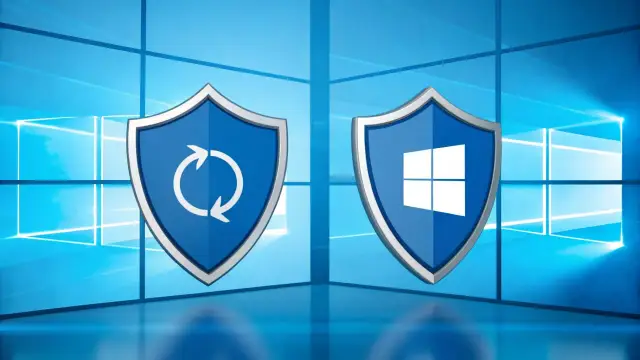 Dwa niebieskie tarcze z symbolami: jedna z ikoną odświeżania, druga z logo Windows. Tło to niebieskie okna, sugerujące system Windows 11 LTSC.