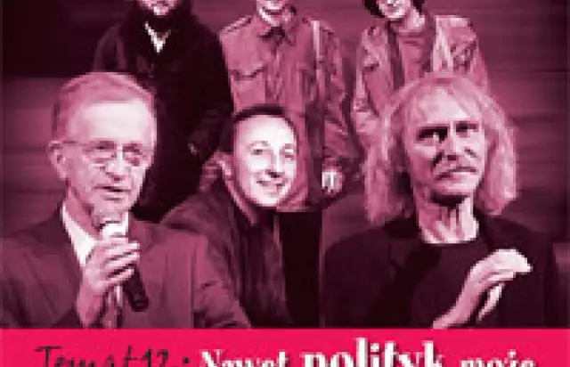 Grupa mężczyzn, jeden z mikrofonem, w teatralnym świetle. Wygląda na parodię polityków.