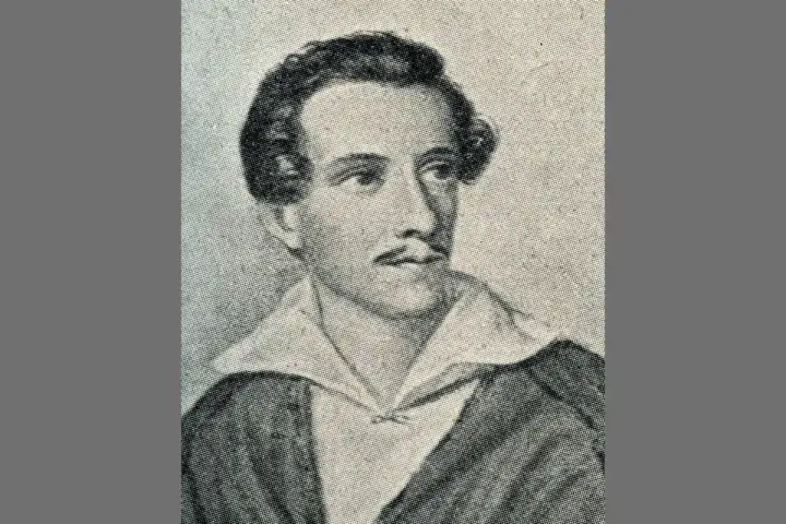 Portret mężczyzny w stylu romantycznym, z wąsami i bujnymi włosami, w białej koszuli i ciemnej marynarce.