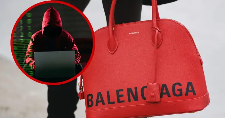Haker w czerwonej bluzie z kapturem przy laptopie, obok czerwona torebka z napisem BALENCIAGA. Czy to balenciaga co to za firma?