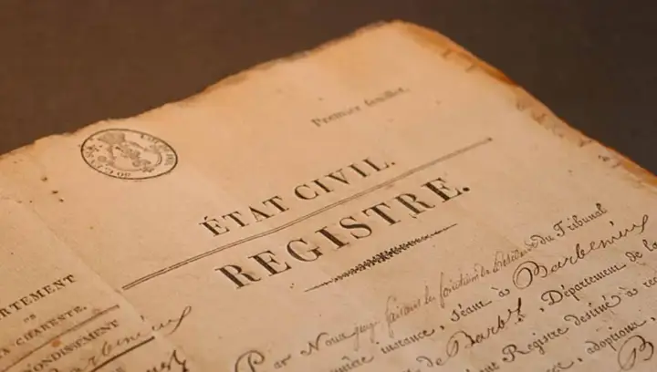 Extrait d'un registre d'état civil 36, datant d'une époque révolue, avec un cachet officiel et une écriture manuscrite.