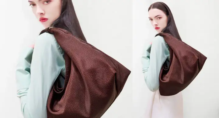 Modella con borsa Borbonese, un tocco di eleganza per le passeggiate a Milano Marittima.