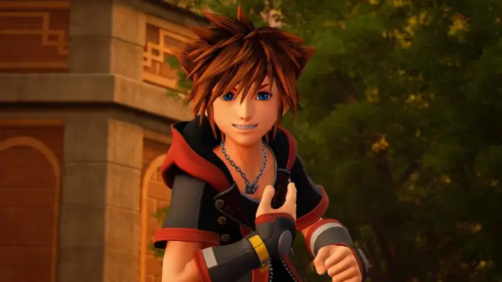 Sora z Kingdom Hearts, z niebieskimi oczami i charakterystycznymi włosami, uśmiecha się, gotowy na przygodę.