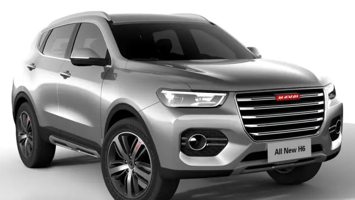 Srebrny SUV Haval H6 z nowoczesnym grillem i światłami LED.