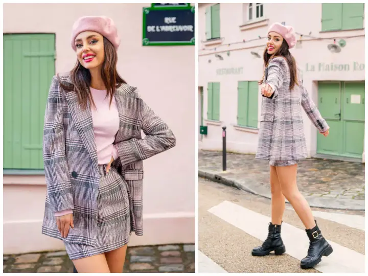 Kobieta w różowym beretce i kraciastej marynarce z kamizelką, prezentująca styl preppy.