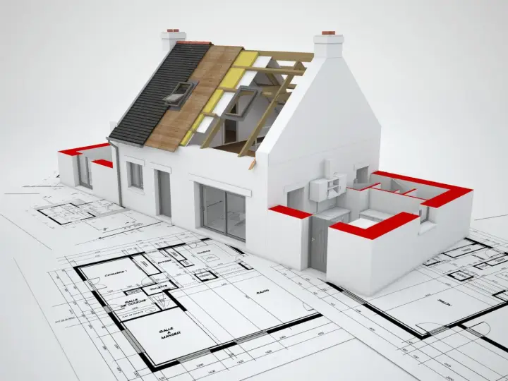 Model domu na planach architektonicznych, ukazujący zmiany istotne prawo budowlane. Izolacja dachu i detale konstrukcyjne.