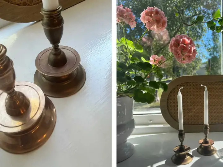 Två antika ljusstakar i mässing, redo att putsa. En kruka med rosa pelargoner står bredvid.