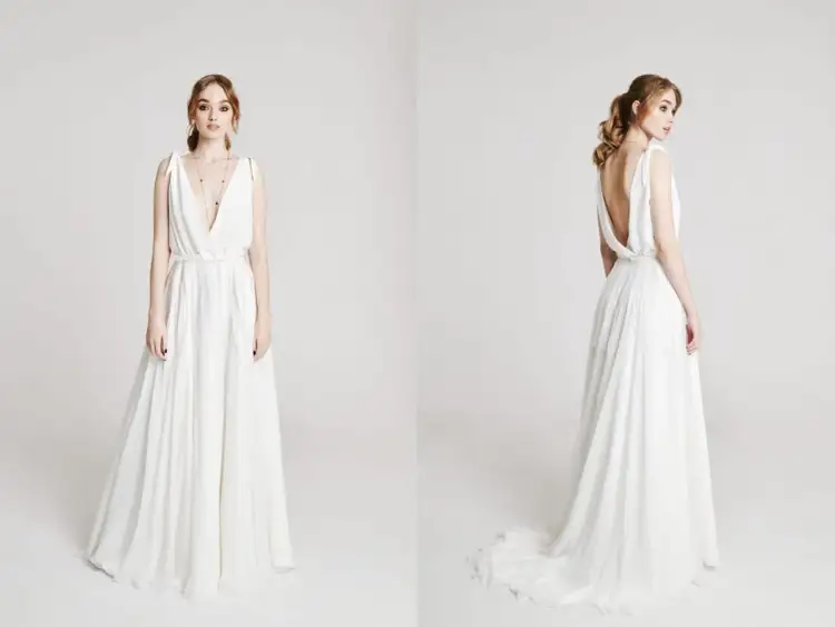 Piękna, zwiewna suknia ślubna z głębokim dekoltem i odkrytymi plecami. Zastanawiasz się, ile kosztuje uszycie sukni ślubnej u krawcowej?