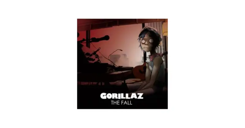 Okładka albumu Gorillaz The Fall. 2D siedzi przy stole z gitarą i sprzętem muzycznym.