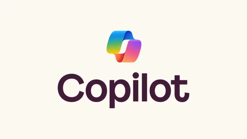 Logo Copilot: tęczowa wstążka i nazwa marki.