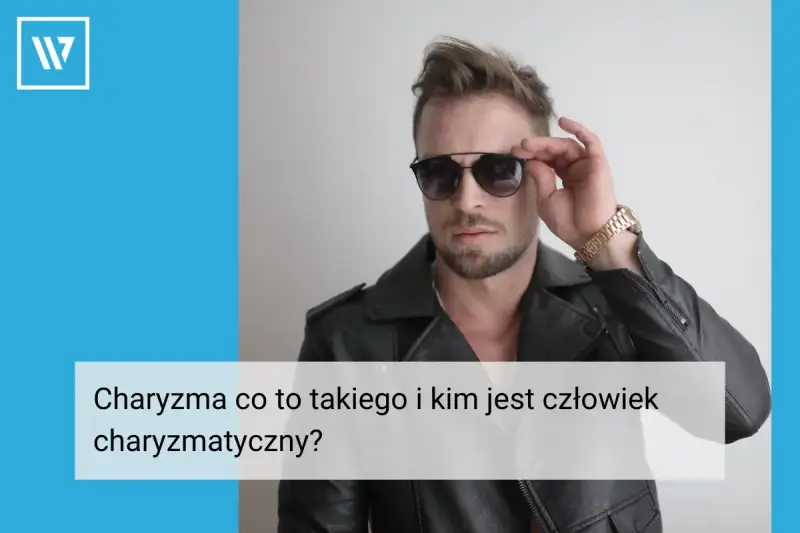 Charyzma co to? Mężczyzna w skórzanej kurtce i okularach przeciwsłonecznych, z pewnością siebie poprawiający okulary.