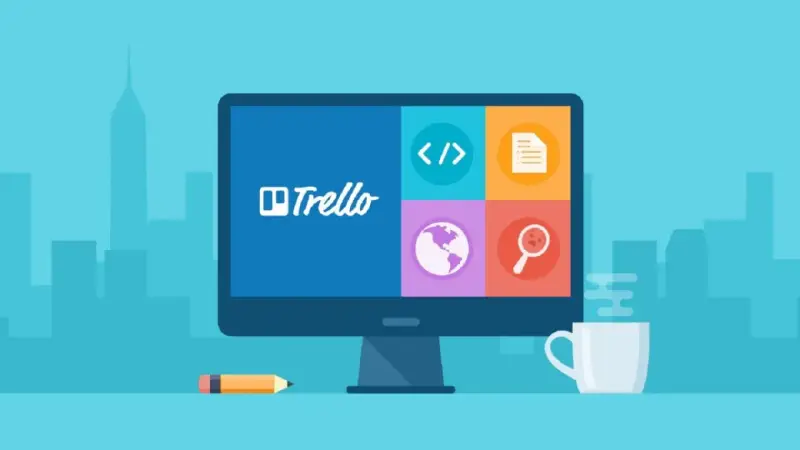 Komputer z logo Trello i ikonami: kod, dokument, świat, lupa. Idealne narzędzie do organizacji pracy, czyli trello co to.