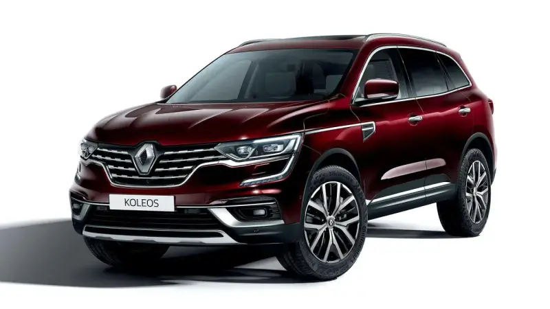 Elegancki, bordowy Renault Koleos 2.0 dCi z chromowanymi detalami i felgami 19 cali, gotowy na każdą podróż.