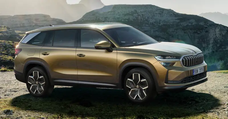 Złoty Skoda Kodiaq na tle górskich krajobrazów. Sprawdź aktualną Skoda Kodiaq cenę i odkryj przygodę!