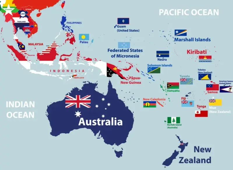 Mapa przedstawia państwa w Oceanii i Azji Południowo-Wschodniej, z zaznaczonymi flagami i nazwami krajów, w tym Australii i Nowej Zelandii.