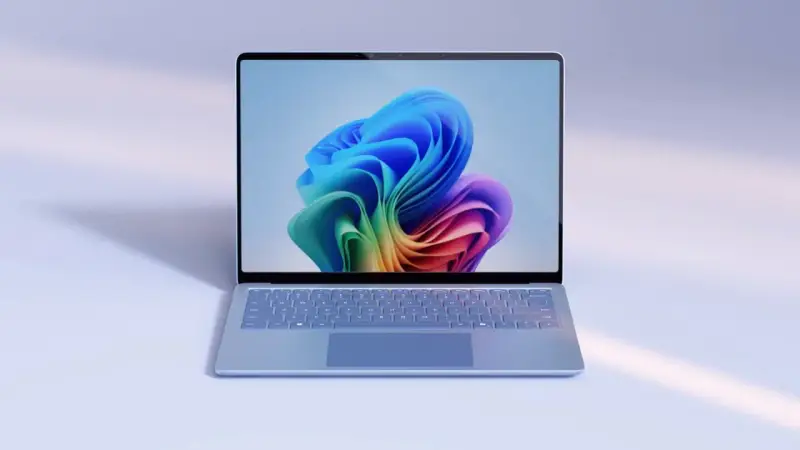 Lekki laptop z kolorową tapetą na ekranie, idealny do optymalizacji systemu za pomocą narzędzi typu windows 11 debloater.