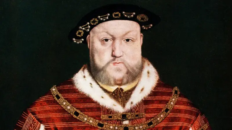Porträt von Heinrich VIII. in prächtiger Kleidung. Seine vielen Ehepartnerinnen kannten seine Macht.