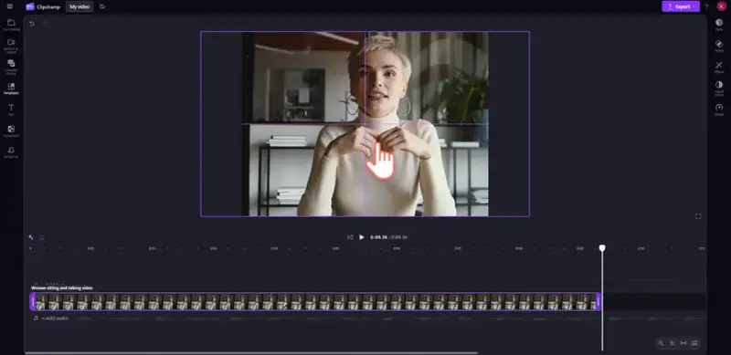 Kobieta w białym golfie, siedząca i mówiąca, z dłonią wskazującą na ekran edytora wideo.