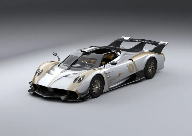 Srebrno-złoty Pagani Huayra R Evo z numerem 1, gotowy do wyścigu.