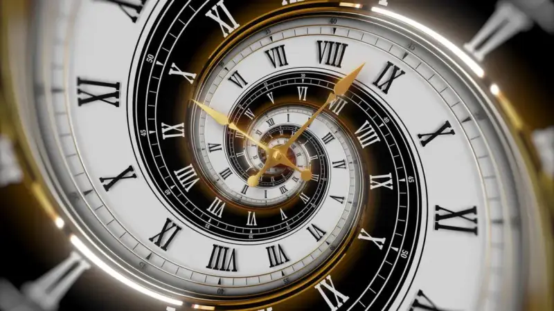 Złoty zegar z rzymskimi cyframi, tworzący spiralę nieskończoności. Symbolizuje 5 rok numerologiczny, czas zmian i rozwoju.
