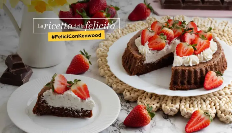 Una crostata morbida al cioccolato, guarnita con panna e fragole fresche, è la ricetta della felicità.