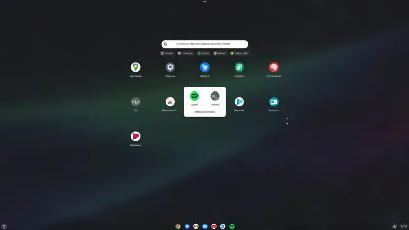 Ekran startowy Chrome OS Flex z ikonami aplikacji, w tym Spotify i Terminal, pogrupowanymi jako "Aplikacje na Linuksa".