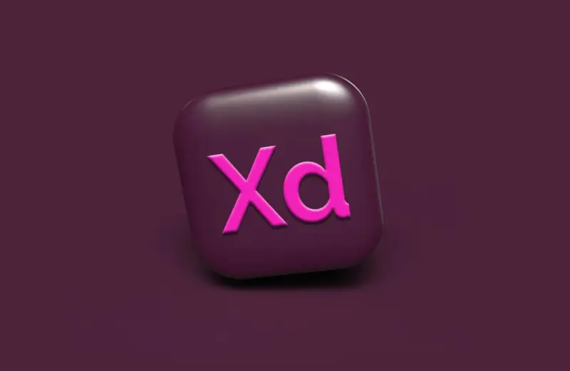 Ikona Adobe XD w kolorze fuksji na ciemnofioletowym tle.
