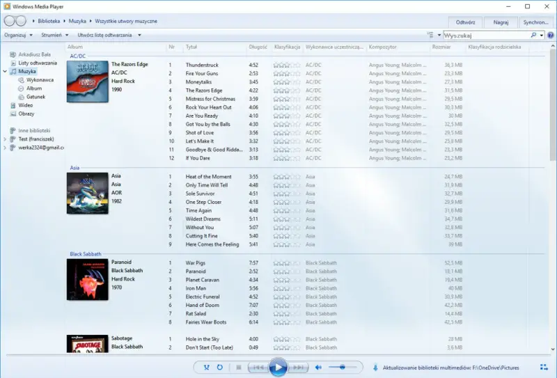 Windows Media Player z listą utworów AC/DC, Asia i Black Sabbath.