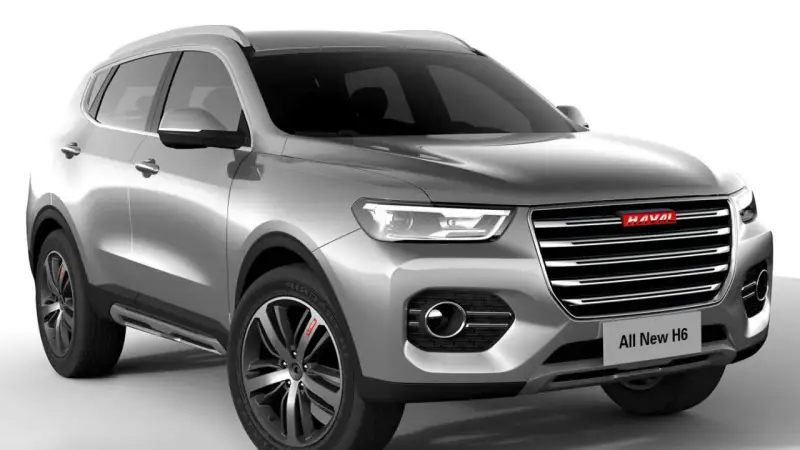 Srebrny SUV Haval H6 z nowoczesnym grillem i światłami LED.