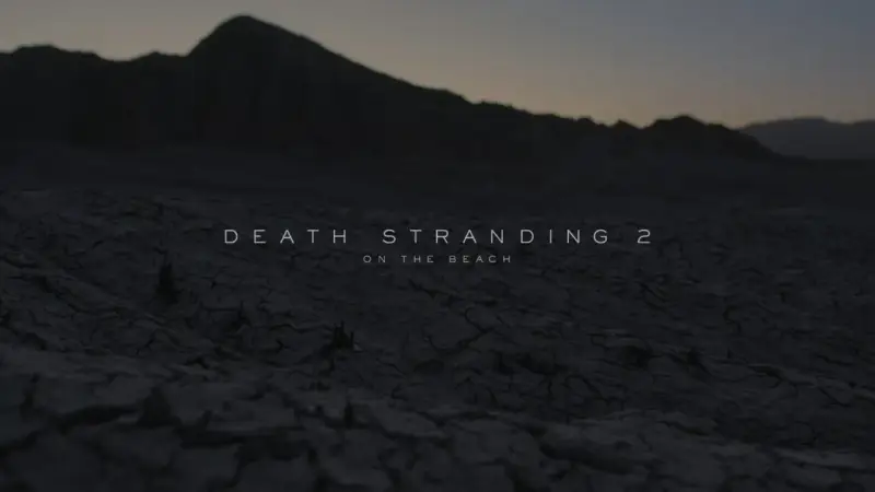 Krajobraz pustynny z napisem "DEATH STRANDING 2 ON THE BEACH". Gra na PC zapowiada się mrocznie.