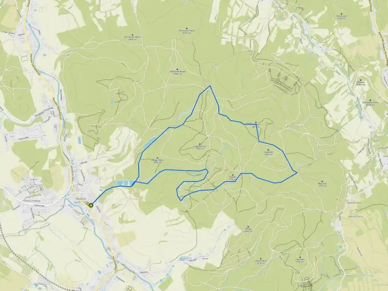 Mapa turystyczna **parku krajobrazowego Gór Sowich** z zaznaczoną trasą pieszą. Widoczne szczyty, drogi i zabudowania.