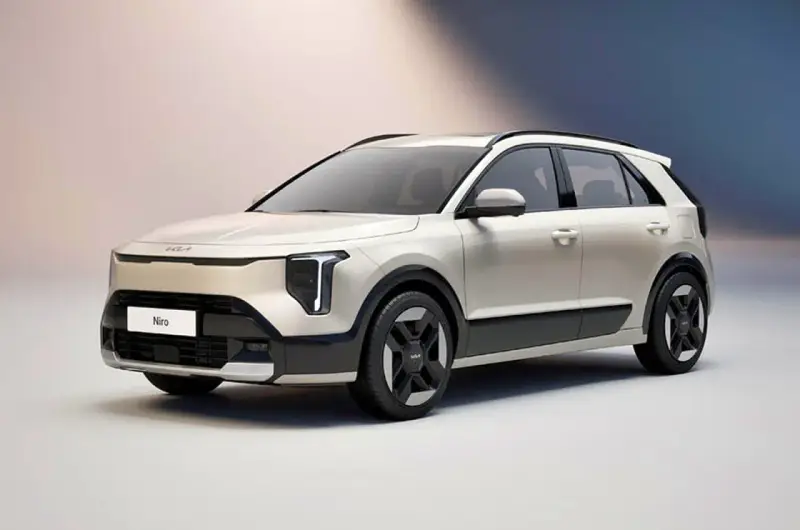 Biały Kia Niro EV z nowoczesnymi światłami i czarnymi akcentami, gotowy na ekologiczną podróż.
