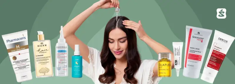 Kobieta aplikuje serum na skórę głowy, otoczona kosmetykami do włosów, w tym produktami z linii biomarine.