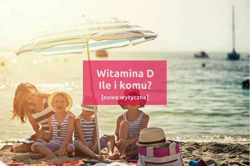 Rodzina na plaży pod parasolem. Witamina D3 na co pomaga? Dowiedz się, ile i komu jej potrzeba.
