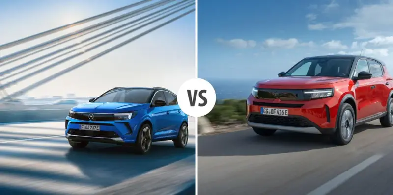 Niebieski i czerwony Opel SUV jadące po drogach, z mostem w tle.