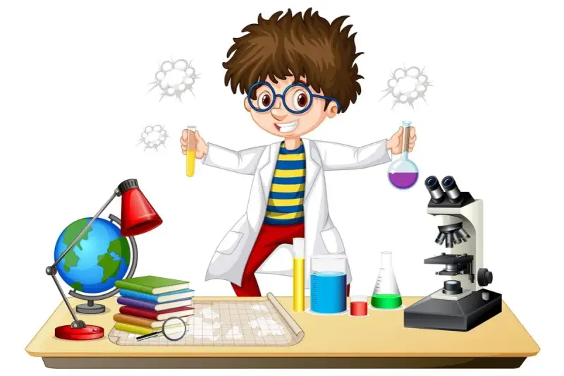 Chłopiec w fartuchu laboratoryjnym z dumą prezentuje swoje **eksperymenty chemiczne dla dzieci**. Na stole stoją probówki, mikroskop i globus.