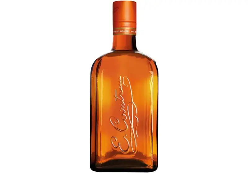 Bernsteinfarbene Flasche mit eingeprägtem Schriftzug, eine Cointreau Alternative für Cocktails.