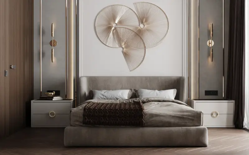 Un'installazione artistica dorata e moderna, perfetta cosa mettere sopra la testata del letto per un tocco di eleganza.