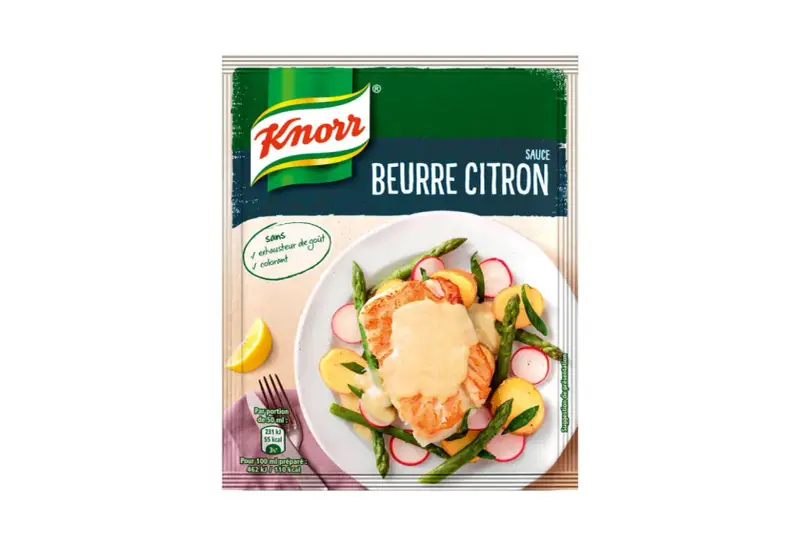 Une assiette de poisson avec des légumes, nappée d'une sauce beurre citron Knorr. Sans exhausteur de goût ni colorant.
