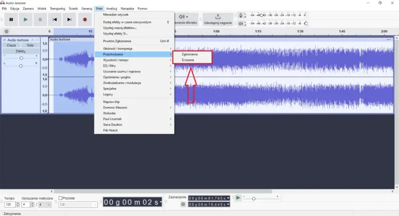 Audacity po polsku: menu "Efekt" z opcjami "Zgłośnienie" i "Ściszenie" na fali dźwiękowej.