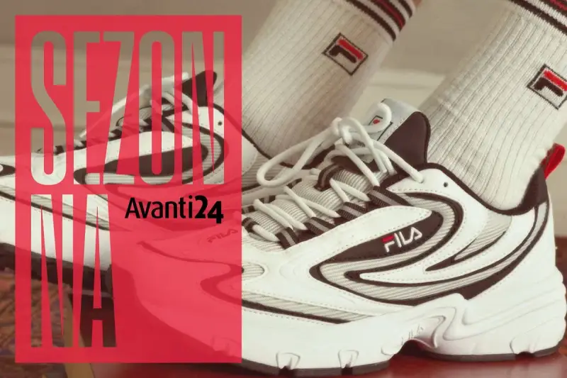 Białe buty sportowe Fila z czerwonym logo. Fila to znana marka odzieży i obuwia sportowego, idealna na nowy sezon.