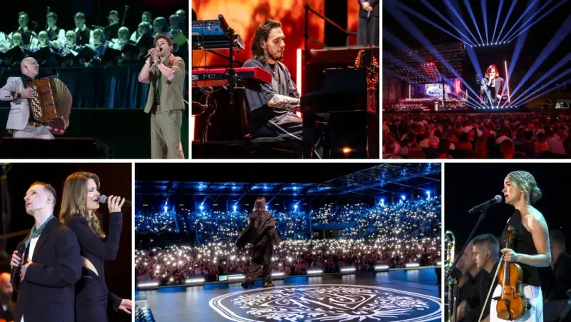 Wielki koncert pieśni współczesne: artyści na scenie, chór, publiczność z telefonami, pianista, akordeonista i skrzypaczka.