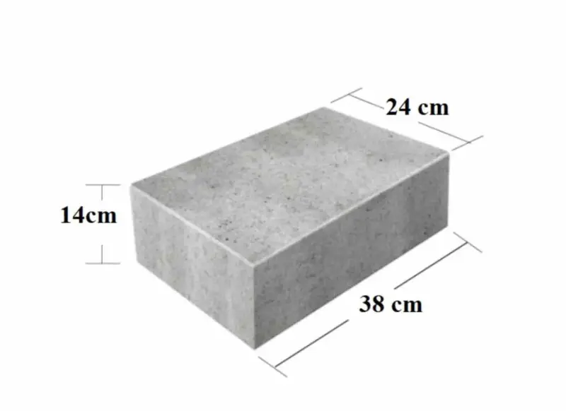 Szary bloczek betonowy o wymiarach 38x24x14 cm. Zastanawiasz się, ile waży bloczek betonowy?