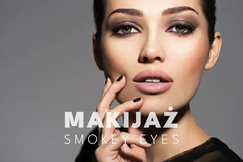 Kobieta z hipnotyzującym makijażem smoky eyes, zmysłowo dotyka ust.
