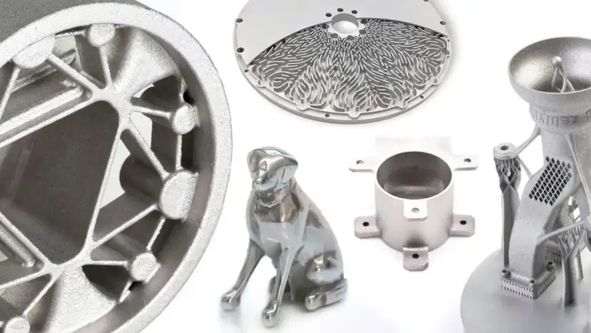 Metalowe wydruki 3D: koło, pies, okrągły element z ażurowym wzorem i części mechaniczne.