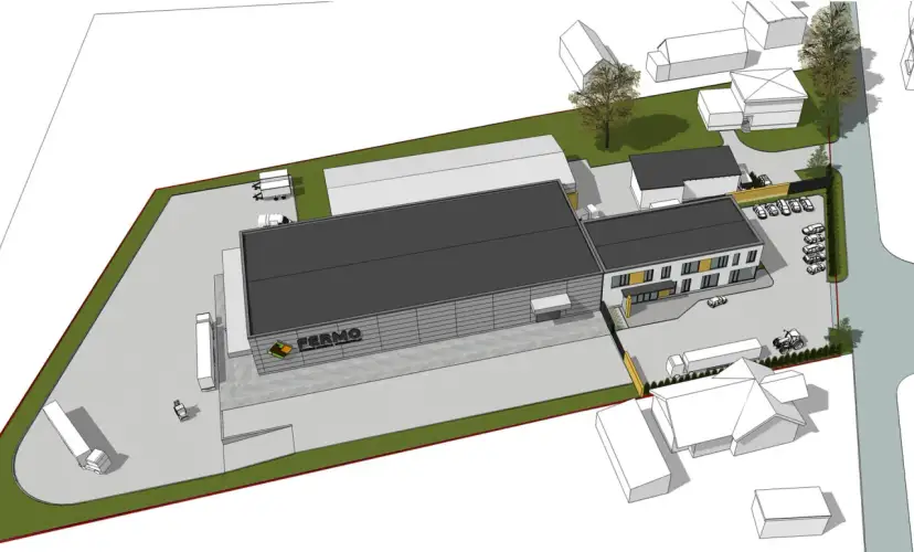 Nowoczesna hala z biurem projektowym. Obok plac manewrowy z ciężarówkami i samochodami.