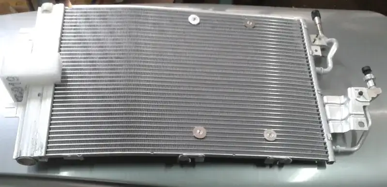 Jak wymienić chłodnicę klimatyzacji Astra H - uniknij kosztownych błędów